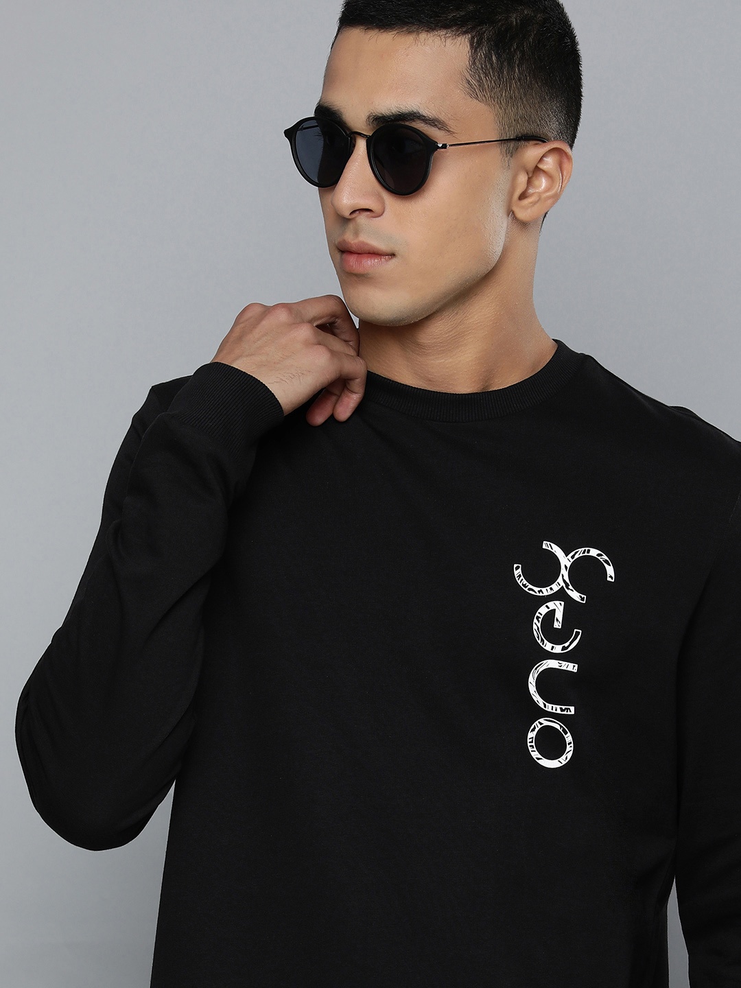 

one8 x PUMA Men Black Slim Fit Virat Kohli Logo Crew Sweatshirt