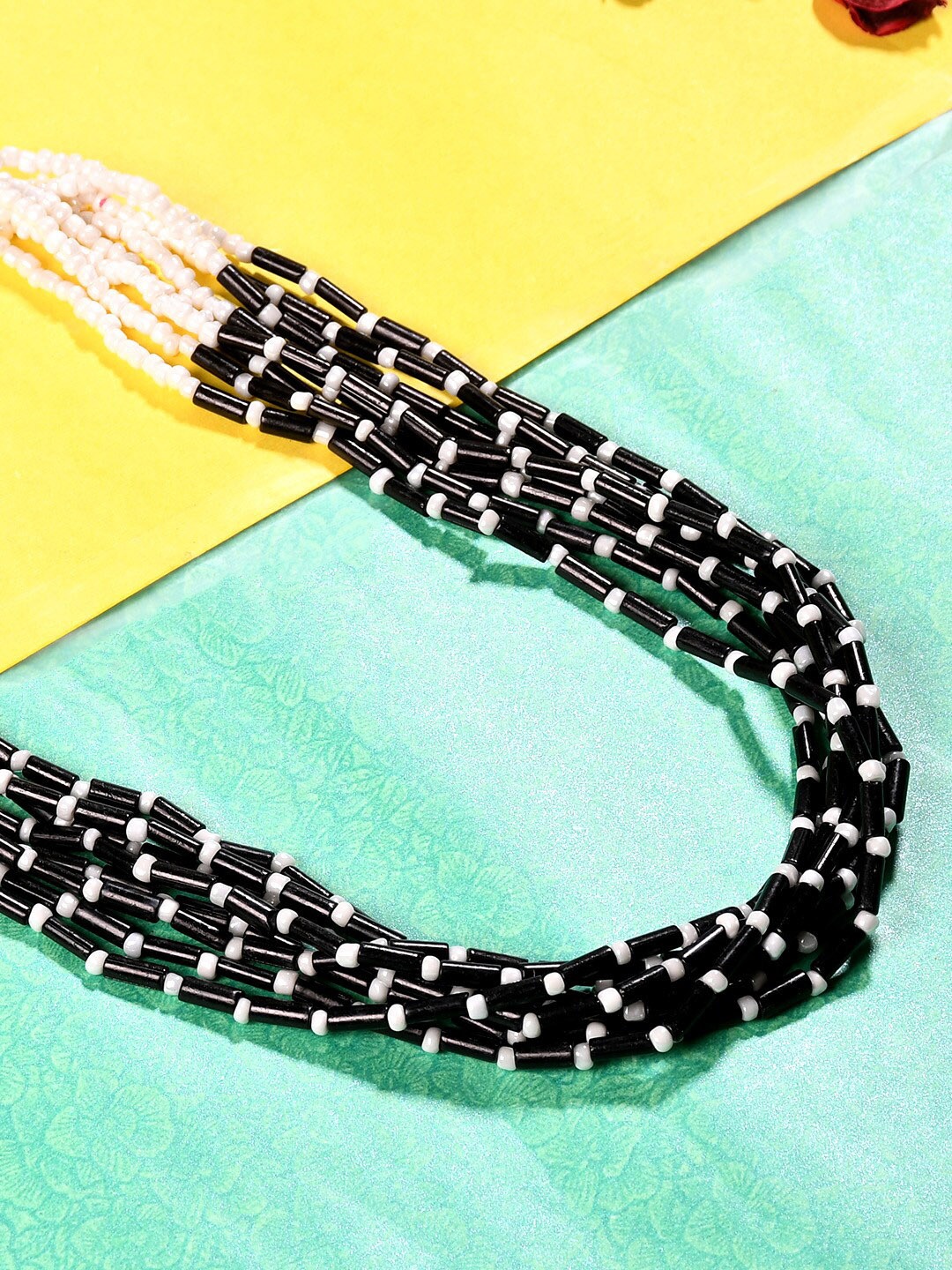 

Bamboo Tree Jewels Black & White Afghan Necklace