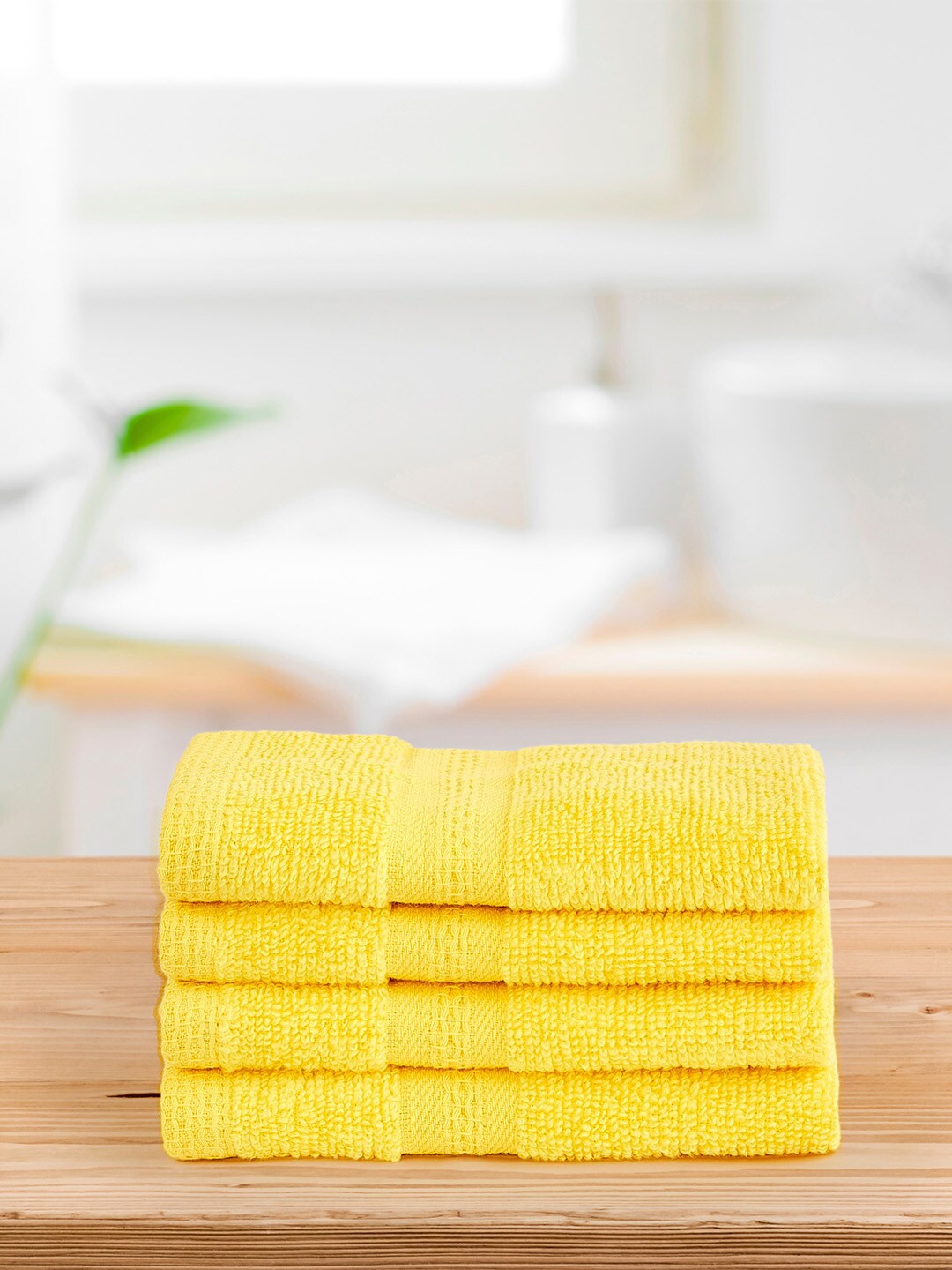 

Layers Yellow Set of 4 400 GSM Zero Twist Face Towels