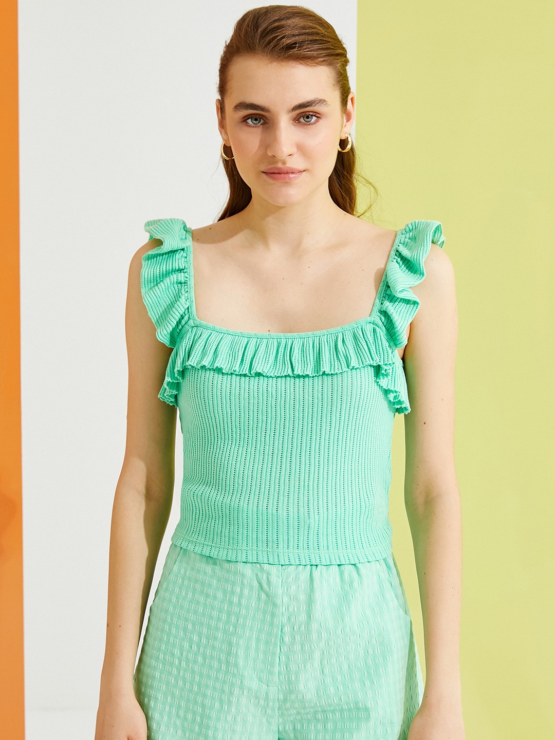 

Koton Green Self Design Ruffles Top
