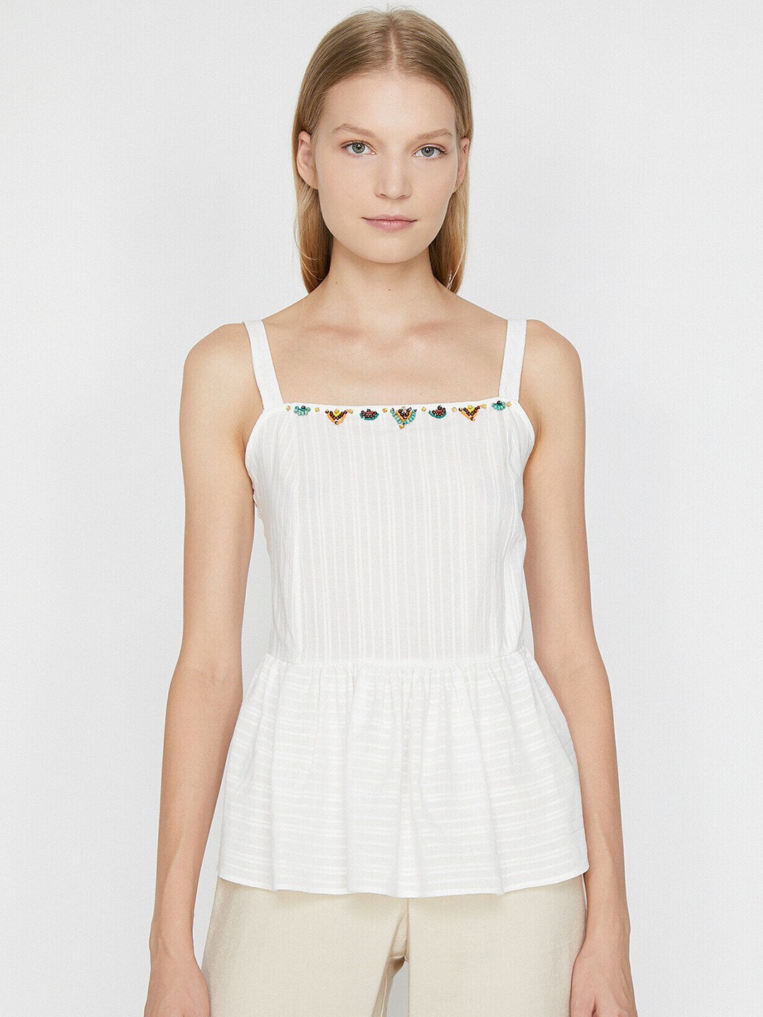 

Koton Off White Self Striped Embellished Peplum Top