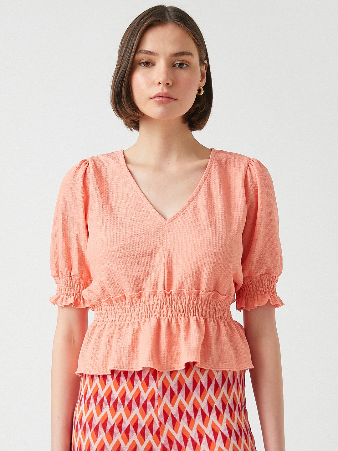

Koton Peach-Coloured Peplum Top