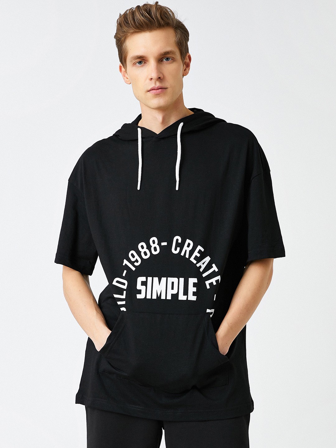 

Koton Men Black Printed Drop-Shoulder Sleeves Hooded T-shirt