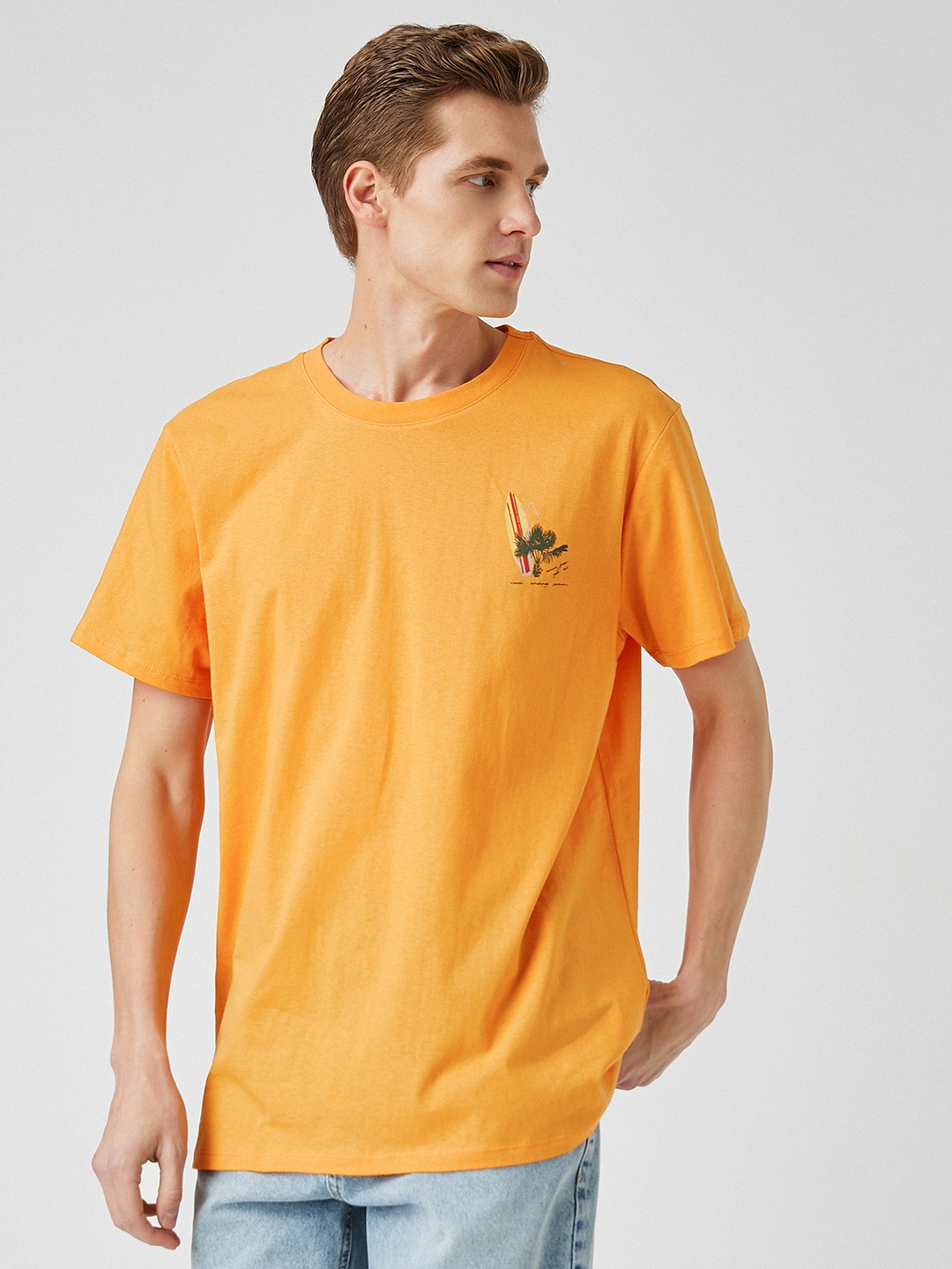 

Koton Men Orange Solid Pure Cotton T-shirt