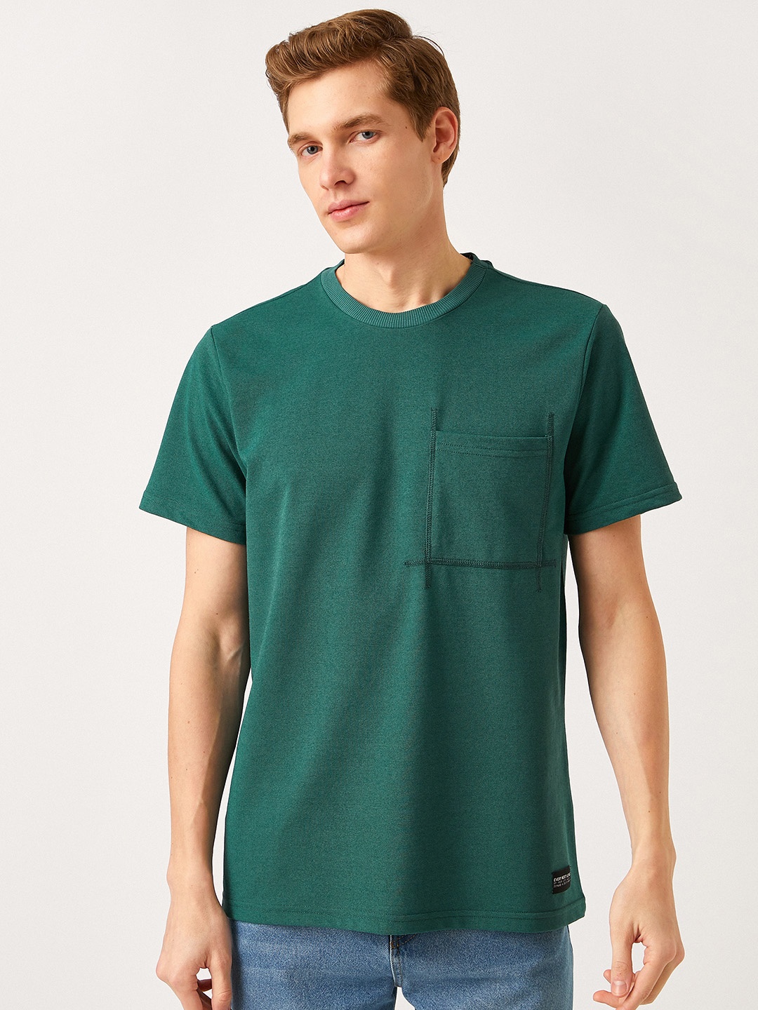 

Koton Men Green Solid Polo Collar T-shirt