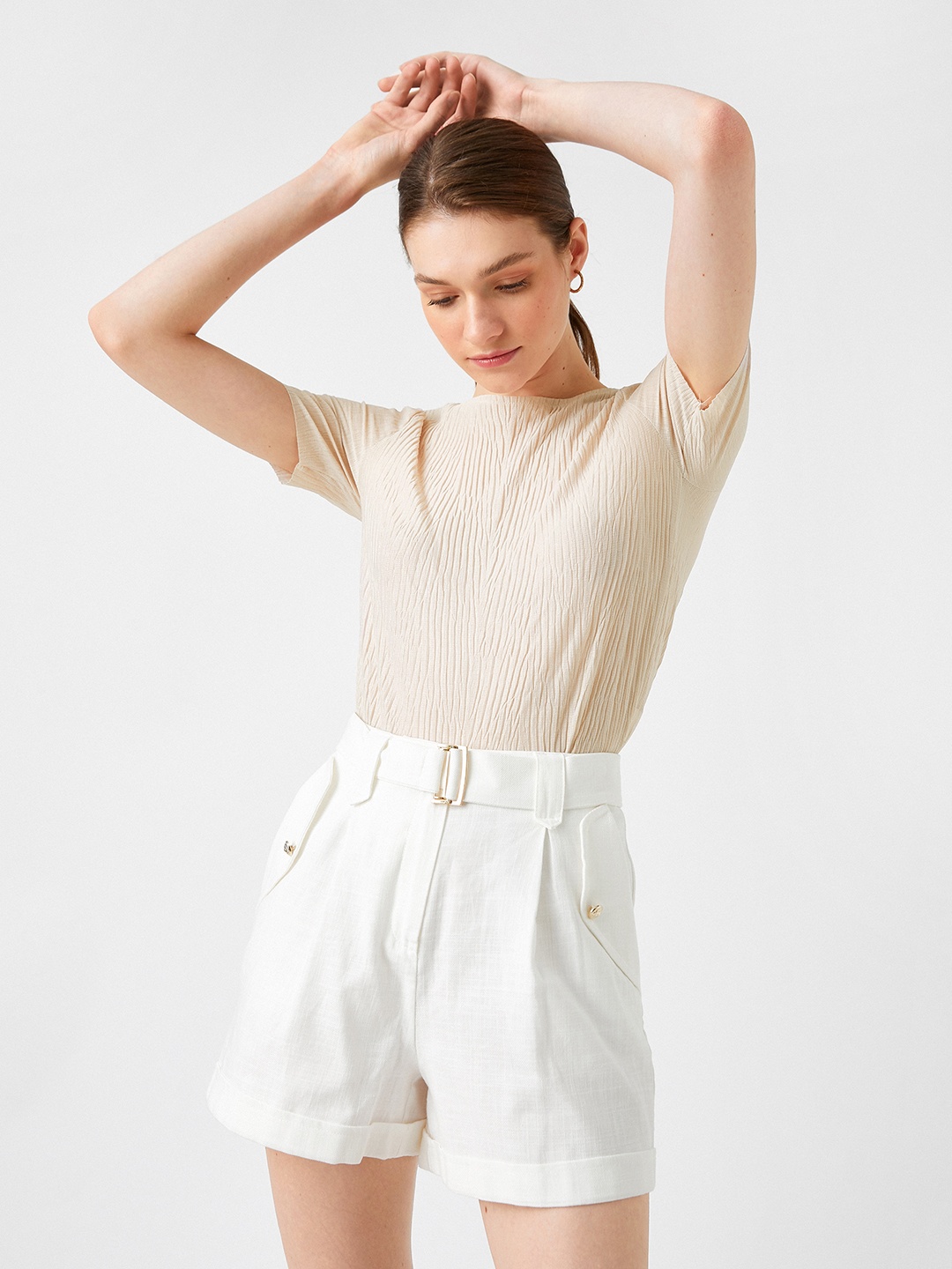 

Koton Women Beige Self Design T-shirt