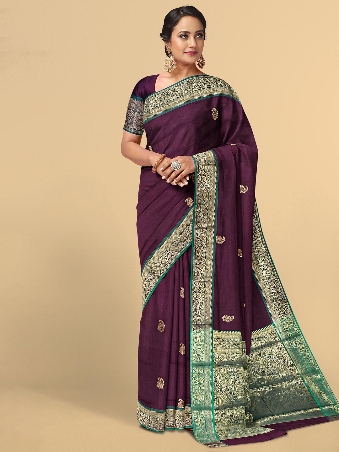 

Kalamandir Green & Burgundy Ethnic Motifs Zari Pashmina Saree