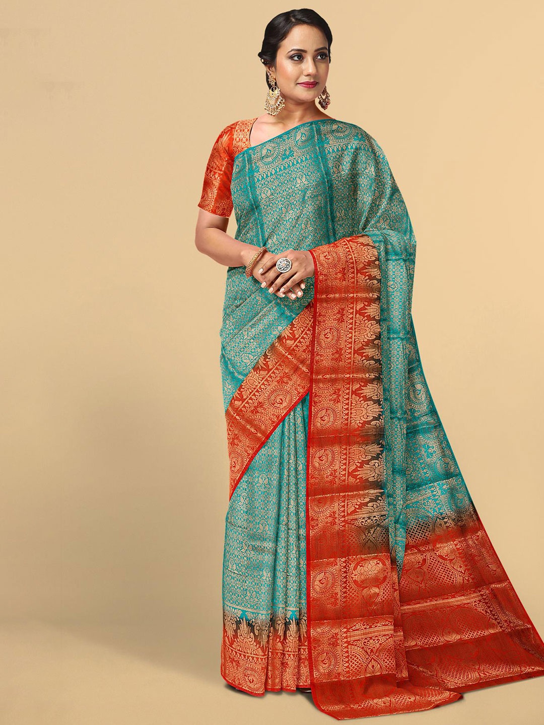 

Kalamandir Teal & Red Ethnic Motifs Zari Silk Blend Saree