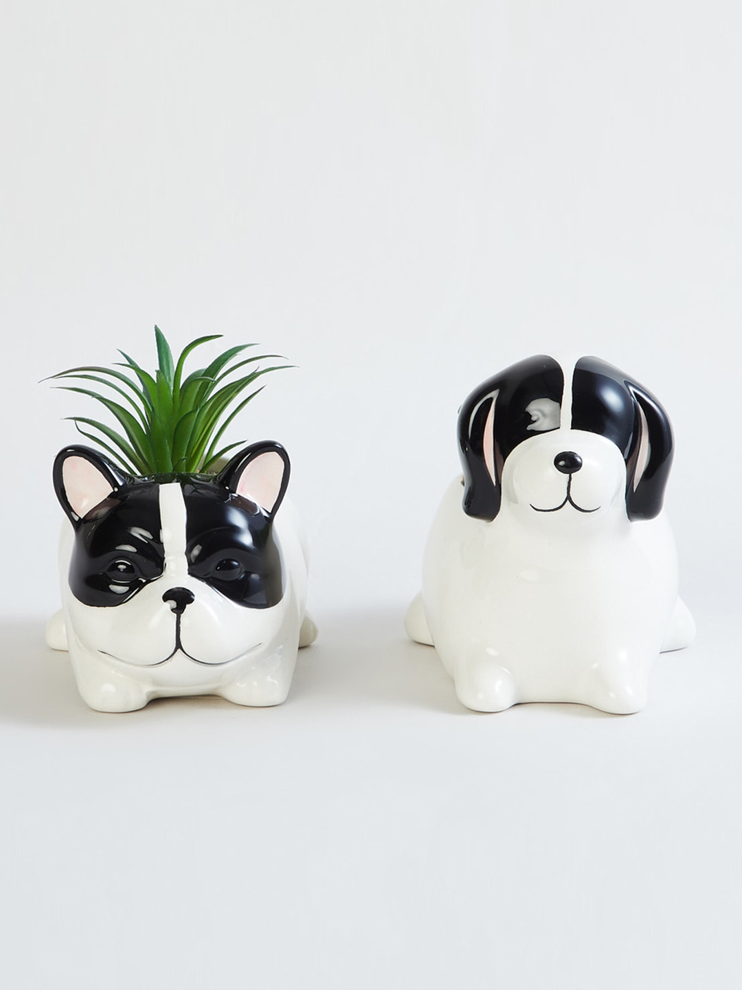 

Home Centre Pack of 2 White Textured Ceramic Dog Planters