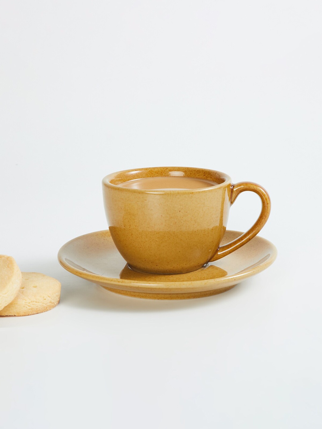 

Home Centre Mirage Yellow Textured Dishwasher safe Stoneware Matte Cup and Saucer