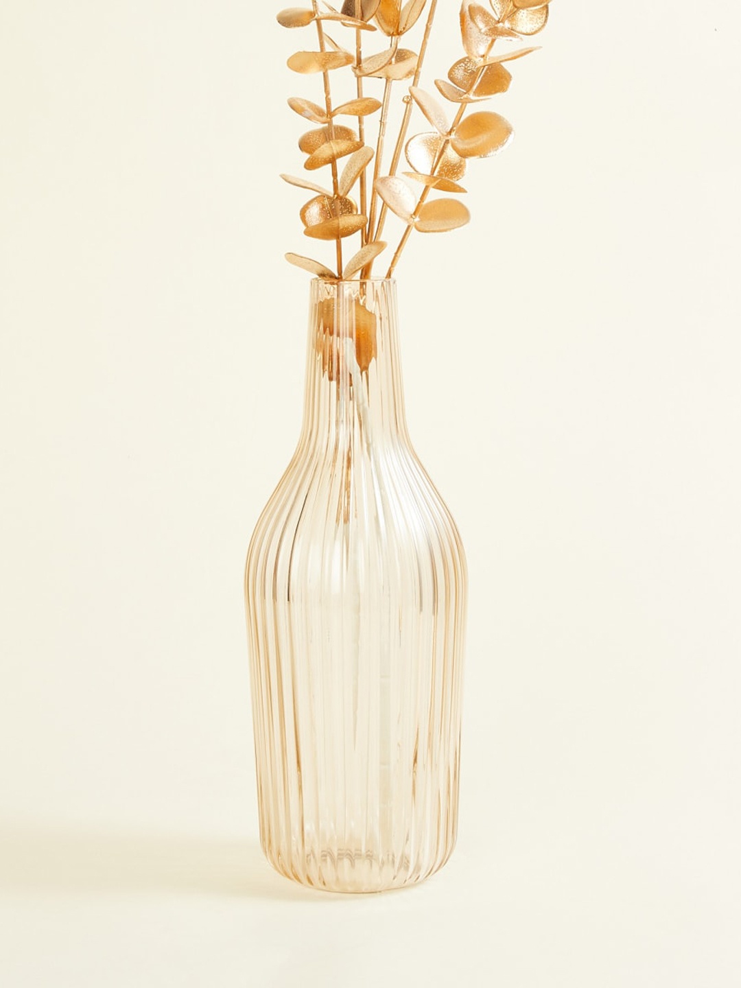 

Home Centre Transparent Textured Glass Floor Vase