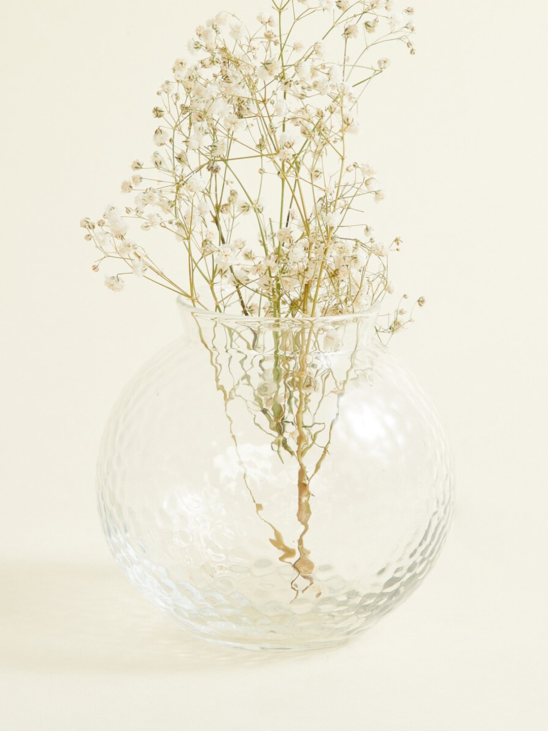 

Home Centre Transparent Textured Round Vases