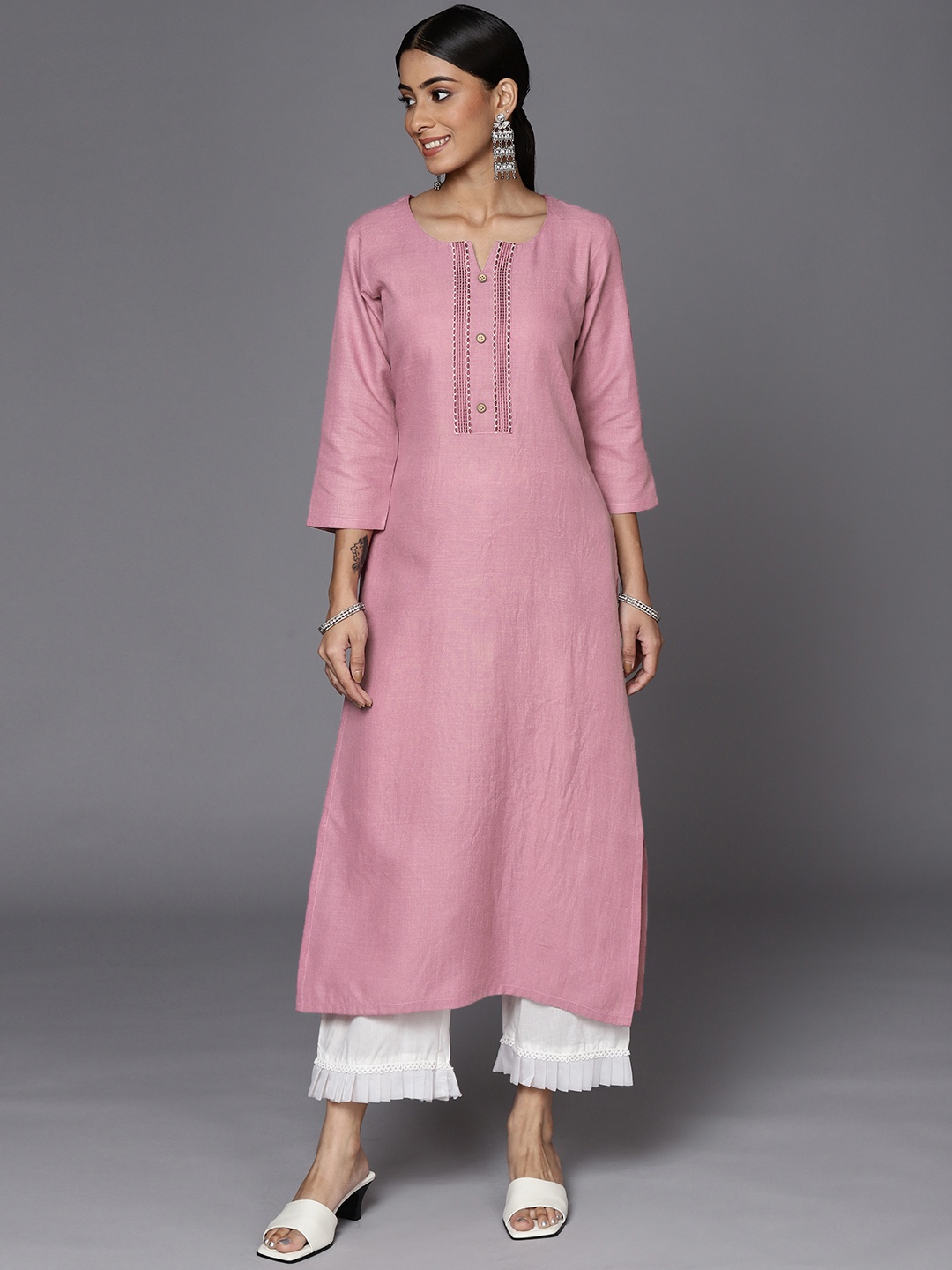 

Varanga Women Mauve Thread Work Kurta