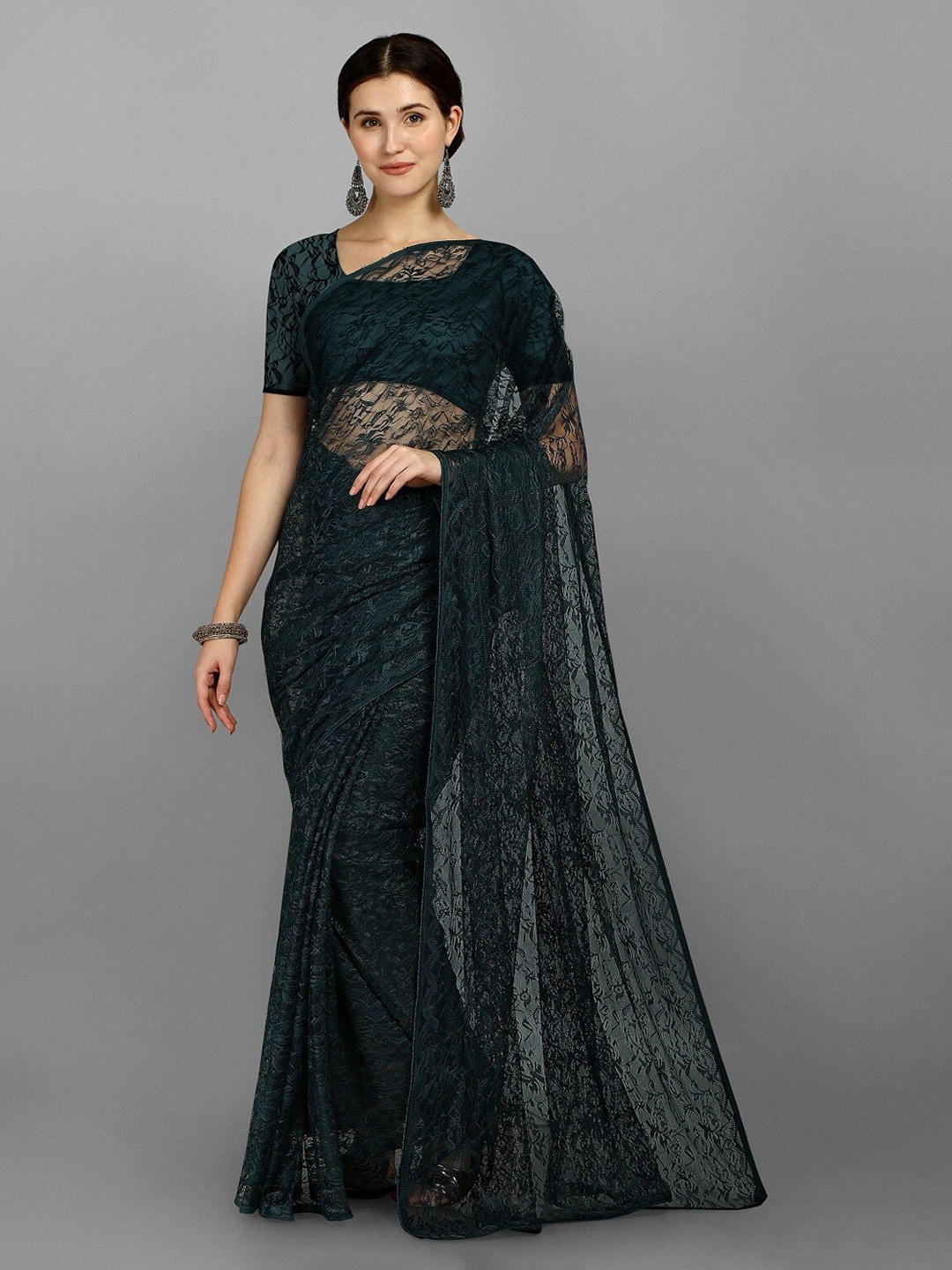 

Fashionuma Women Teal Woven Design Net Saree