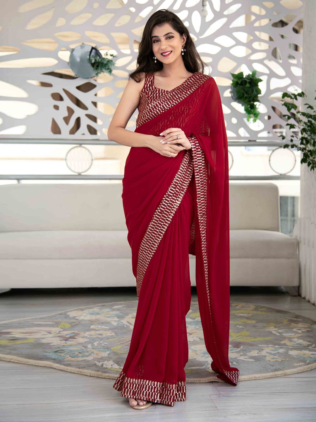 

Fashionuma Red Solid Pure Georgette Saree