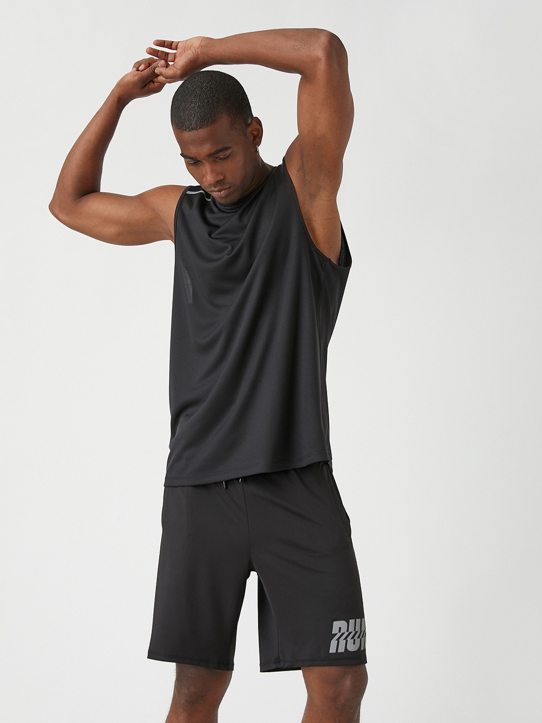 

Koton Men Black Solid T-shirt