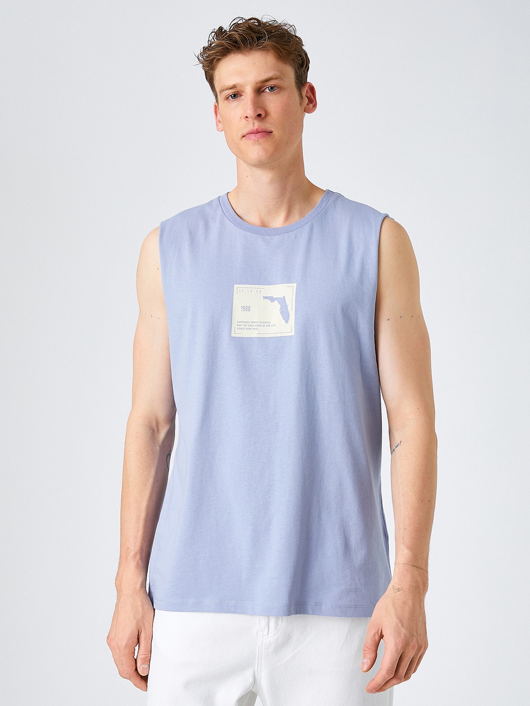 

Koton Men Blue Pure Cotton T-shirt with Printed Back