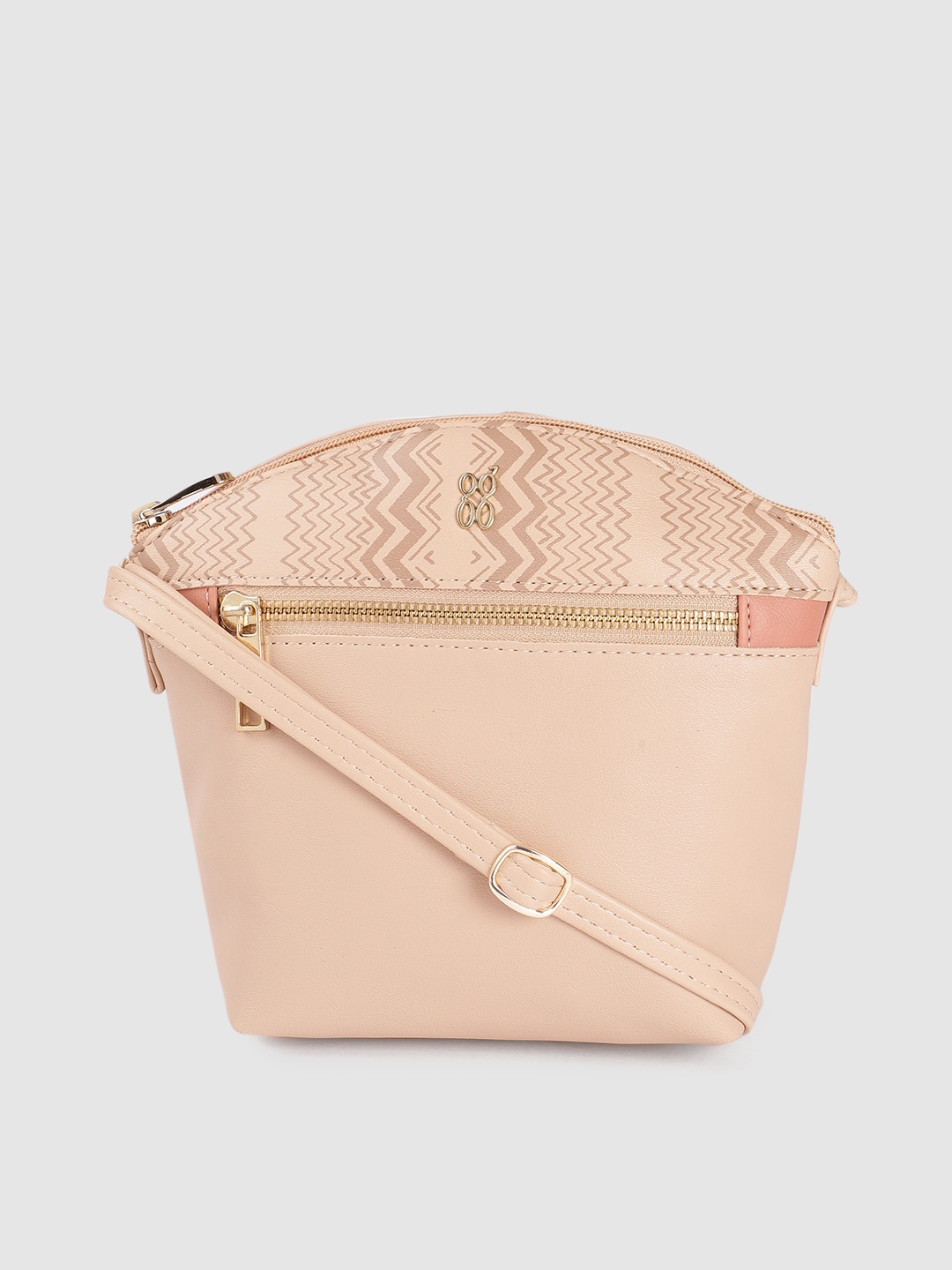 

Baggit Nude-Coloured Solid Structured Regular Sling Bag With Minimal Chevron Print Detail