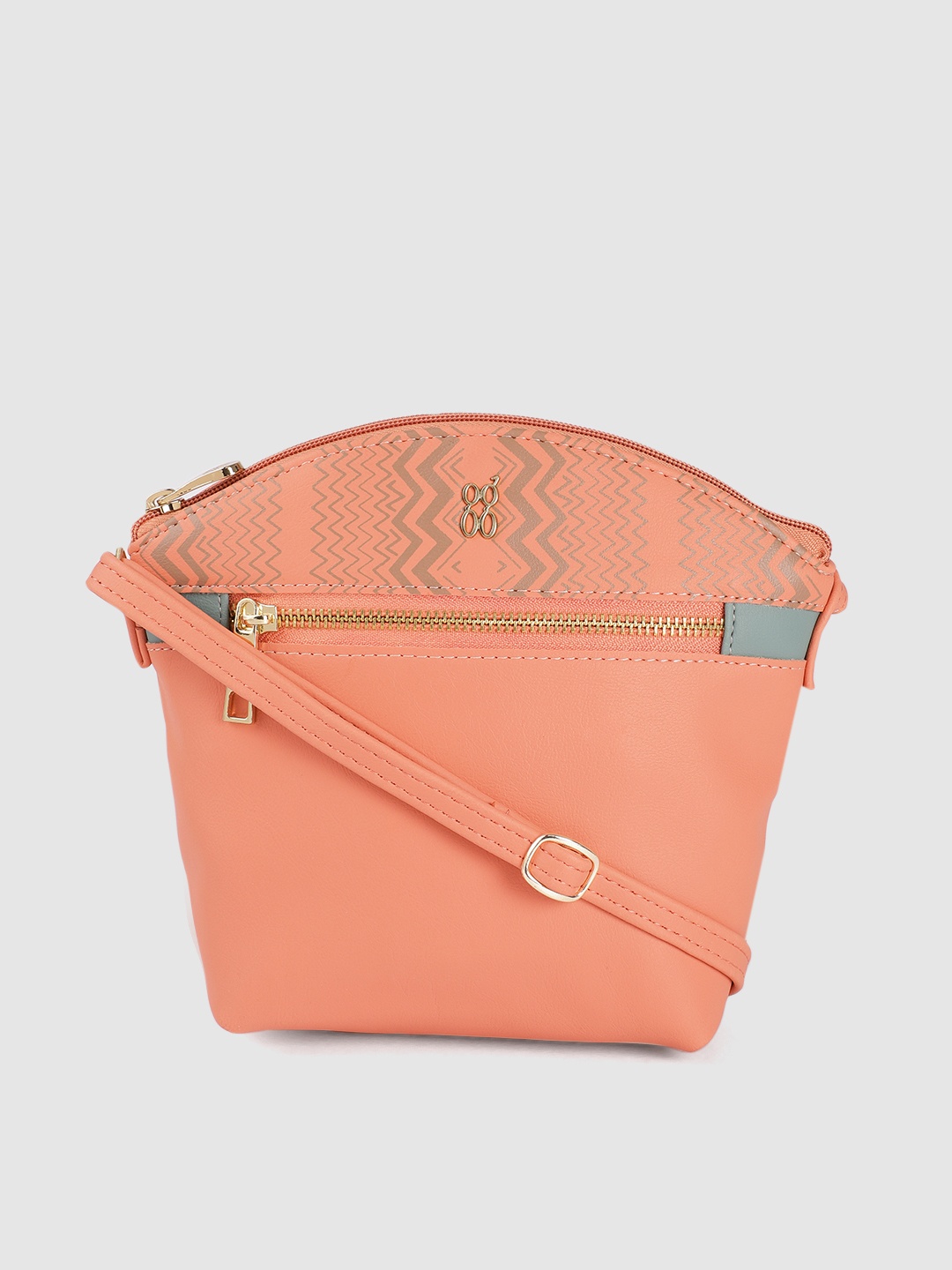 

Baggit Peach Pink Solid Structured Regular Sling Bag With Minimal Chevron Print Detail