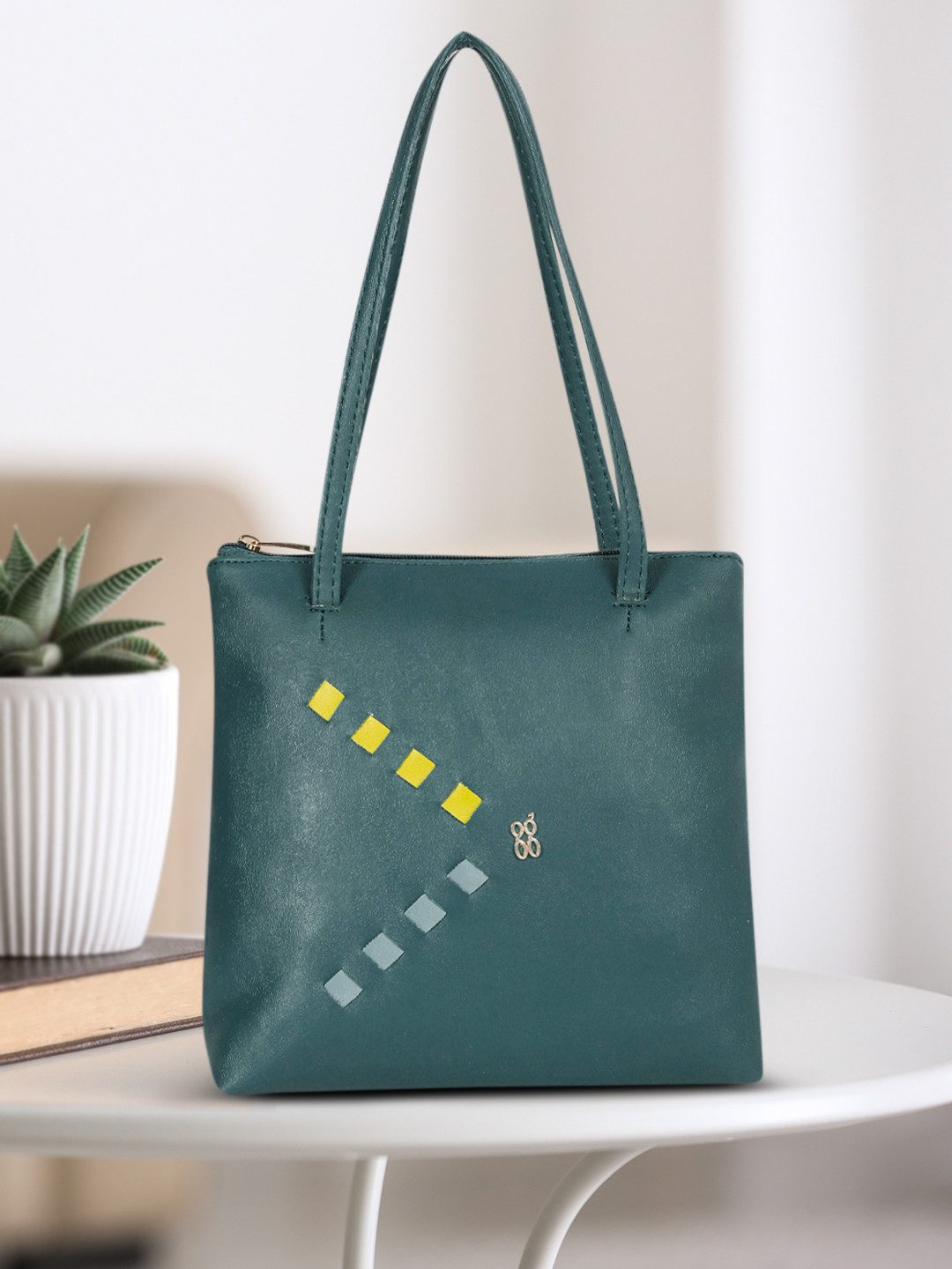 

Baggit Teal Green Solid Structured Shoulder Bag
