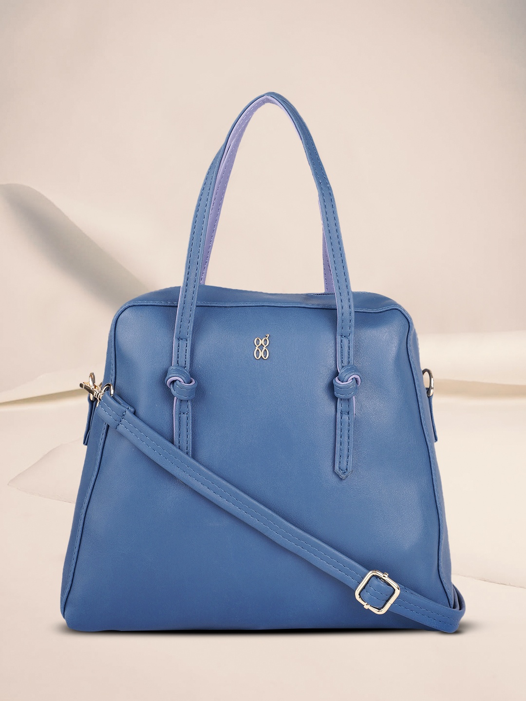 

Baggit Blue Solid Handheld Bag