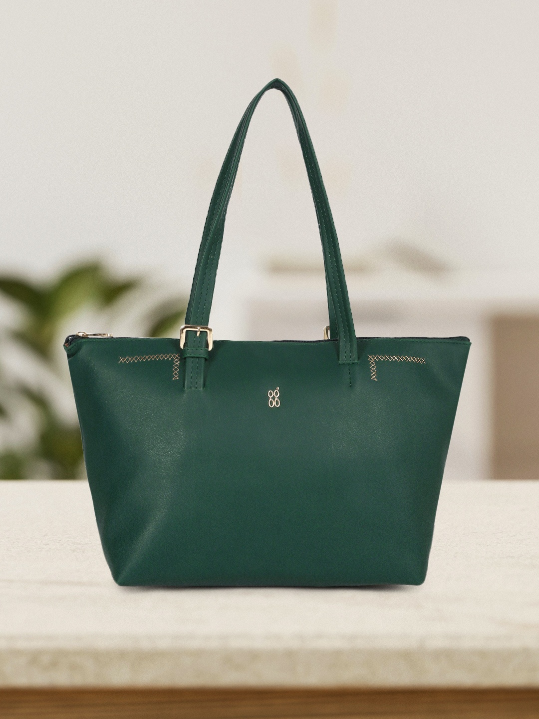 

Baggit Teal Green Solid Structured Shoulder Bag