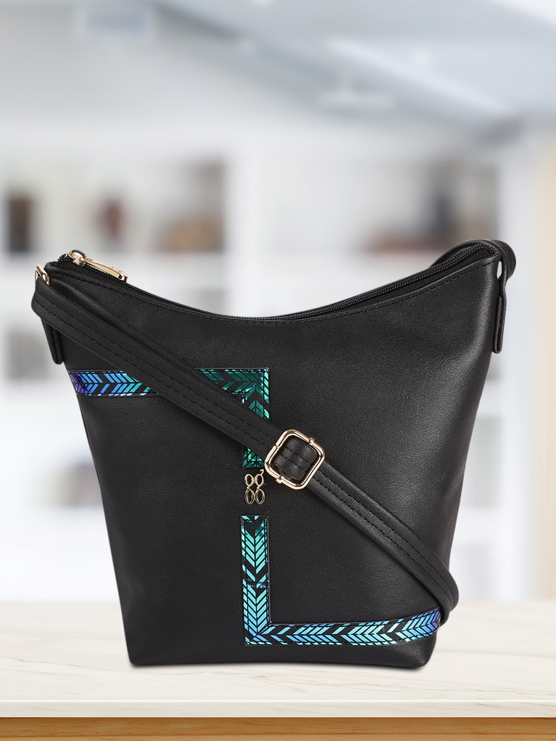 

Baggit Women Black Structured Sling Bag