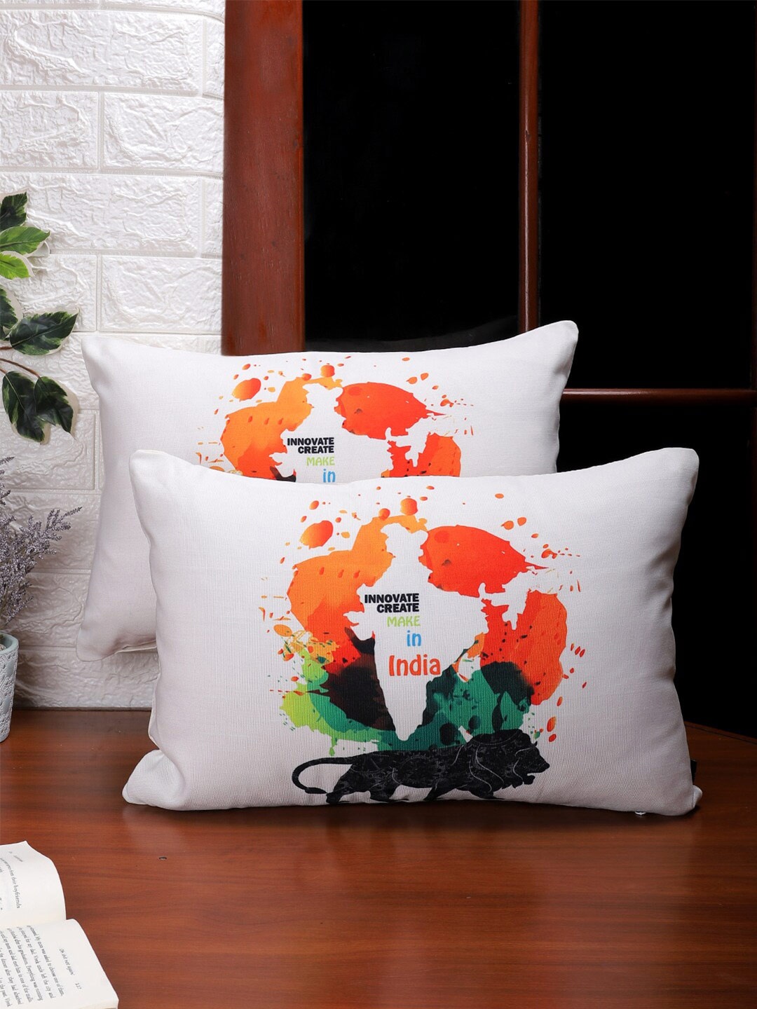 

Soumya White & Orange Set of 2 Abstract Linen Rectangle Cushion Covers
