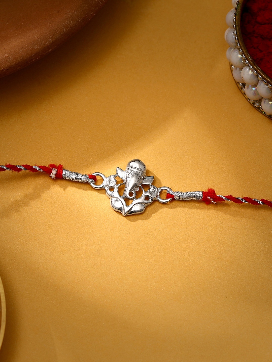 

GIVA Men 92.5 Maroon & Silver-Toned Sterling Silver Lord Ganesha Studded Rakhi