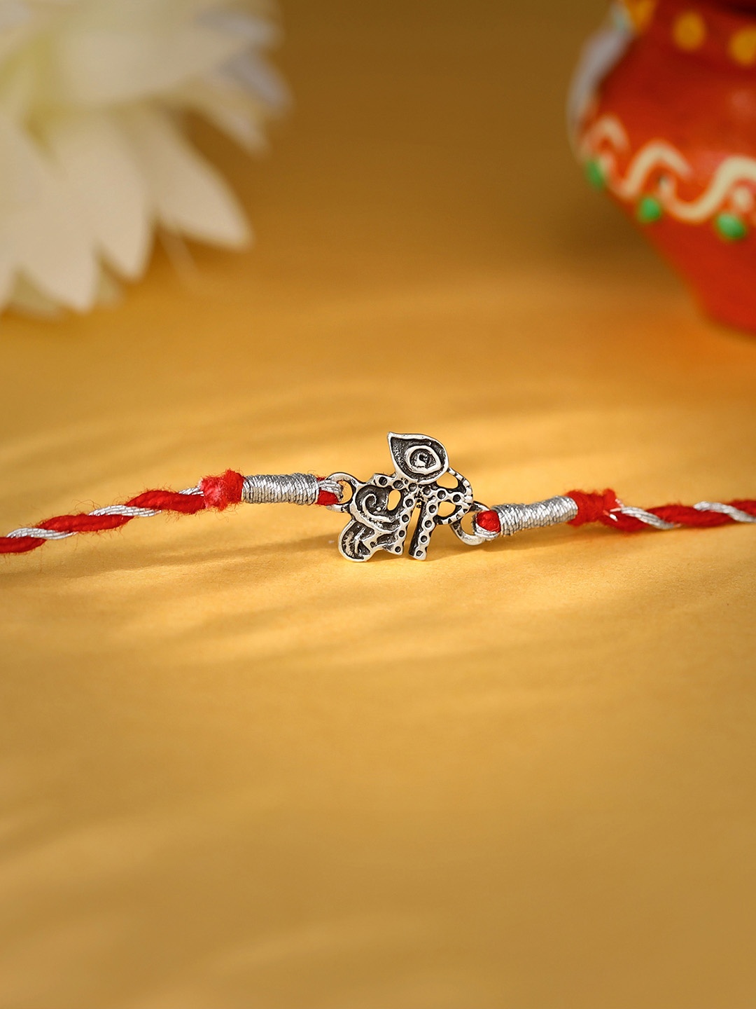 

GIVA 92.5 Sterling Silver Rakhi With Roli & Chawal