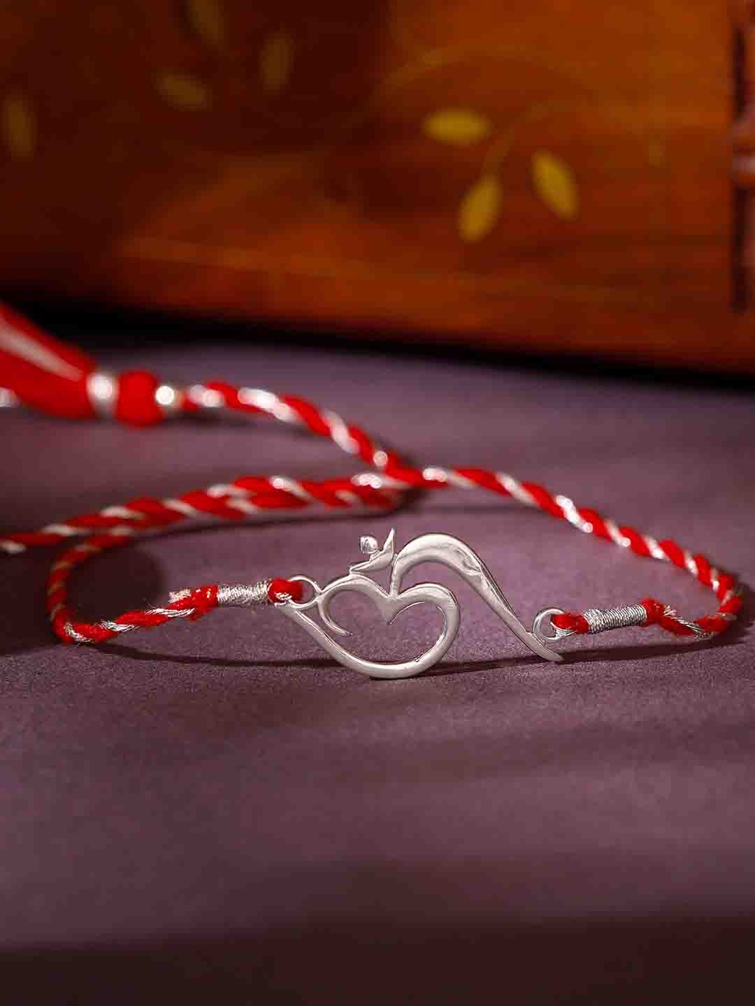 

GIVA Red & Silver-Toned Om Thread Rakhi