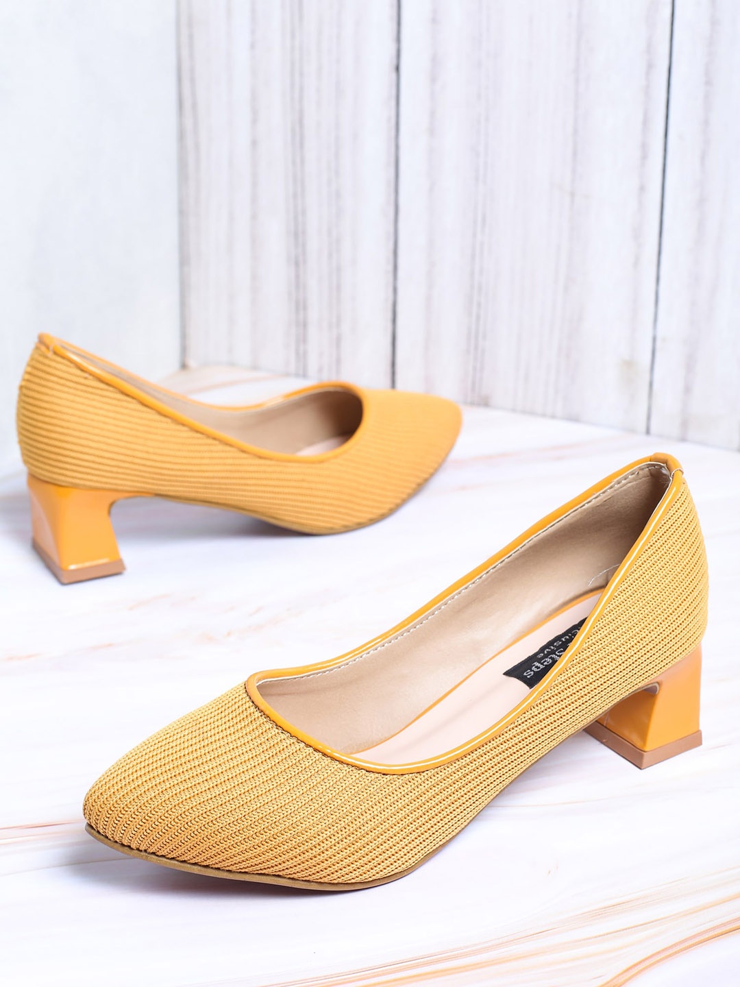 

LONDON STEPS Women Yellow Textured Block Pumps