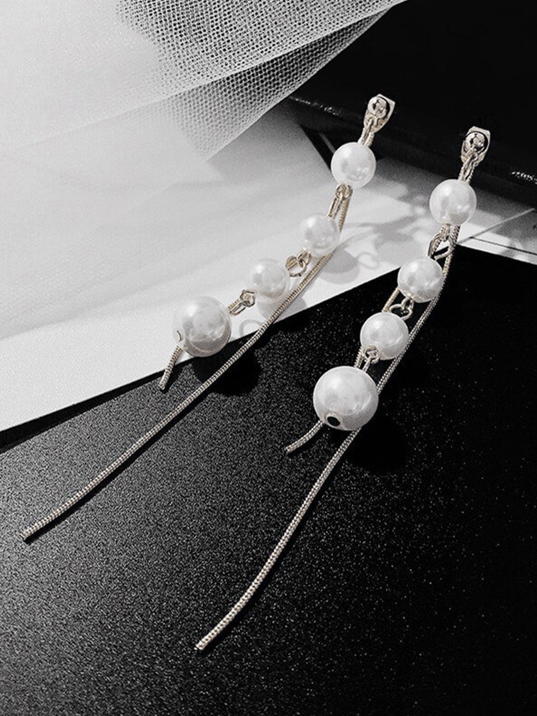 

Unwind by Yellow Chimes Silver-Plated Pearl Dangler Drop Earrings