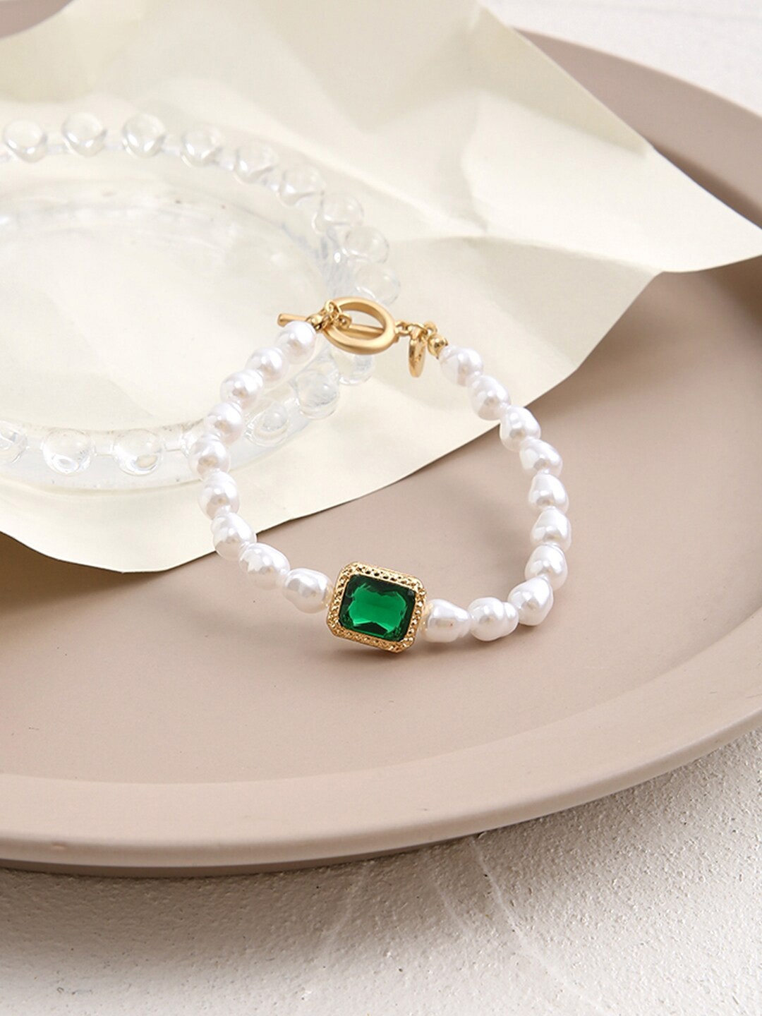 

Unwind by Yellow Chimes Women Green Crystal Charmed Pearl Beadded Bracelet, White