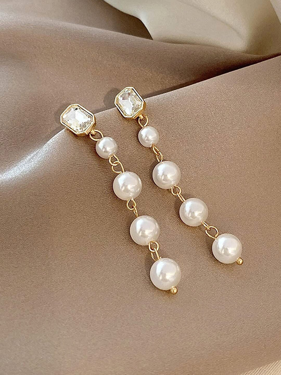 

Unwind by Yellow Chimes Gold-Plated Crystal Studded Pearl Dangler Earrings