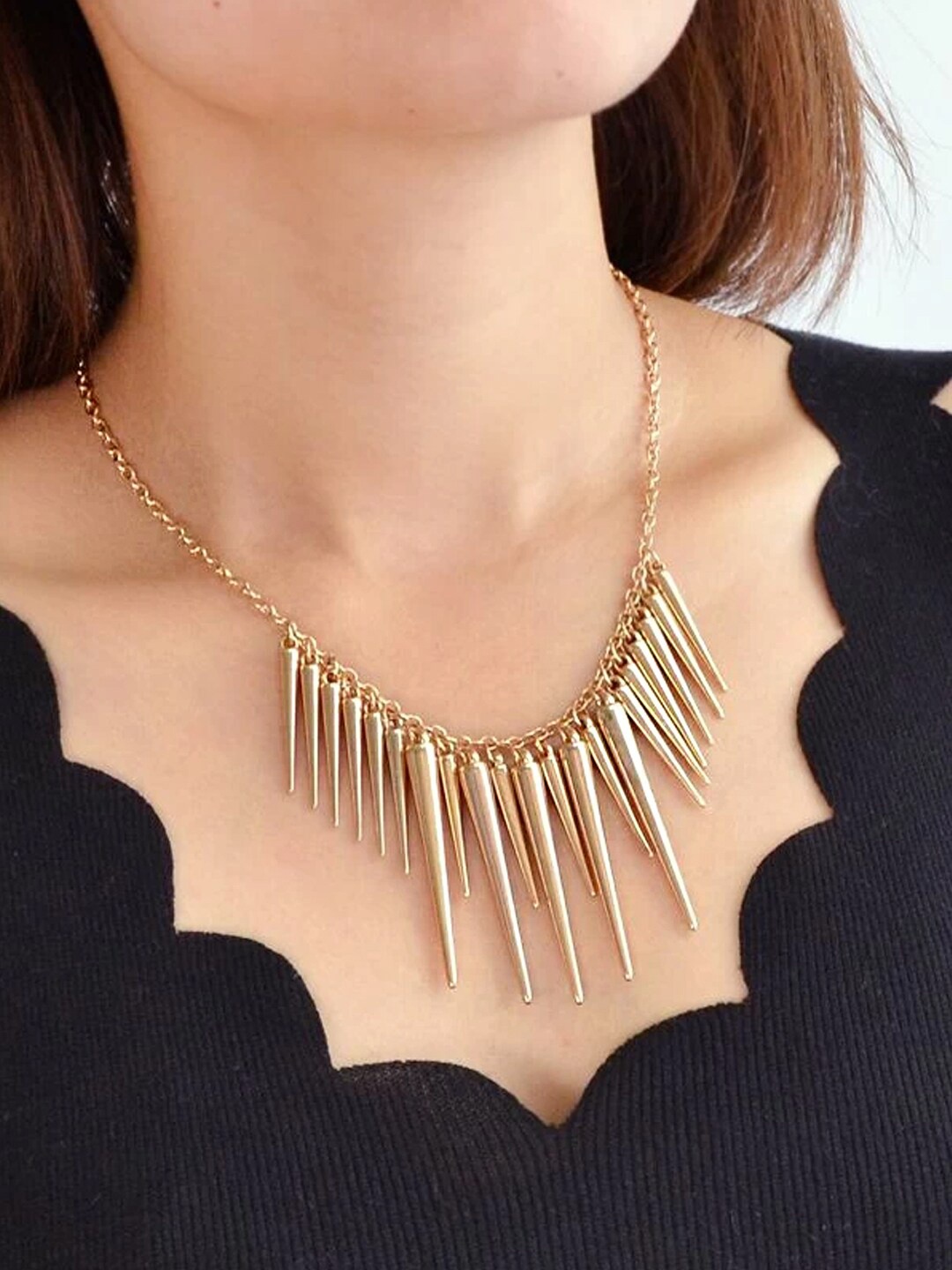 

Unwind by Yellow Chimes Gold Toned Bold Charmed Necklace