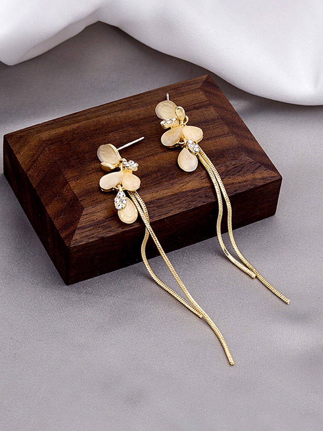 

Unwind by Yellow Chimes Gold-Toned White Crystal Studded Dangler Earrings