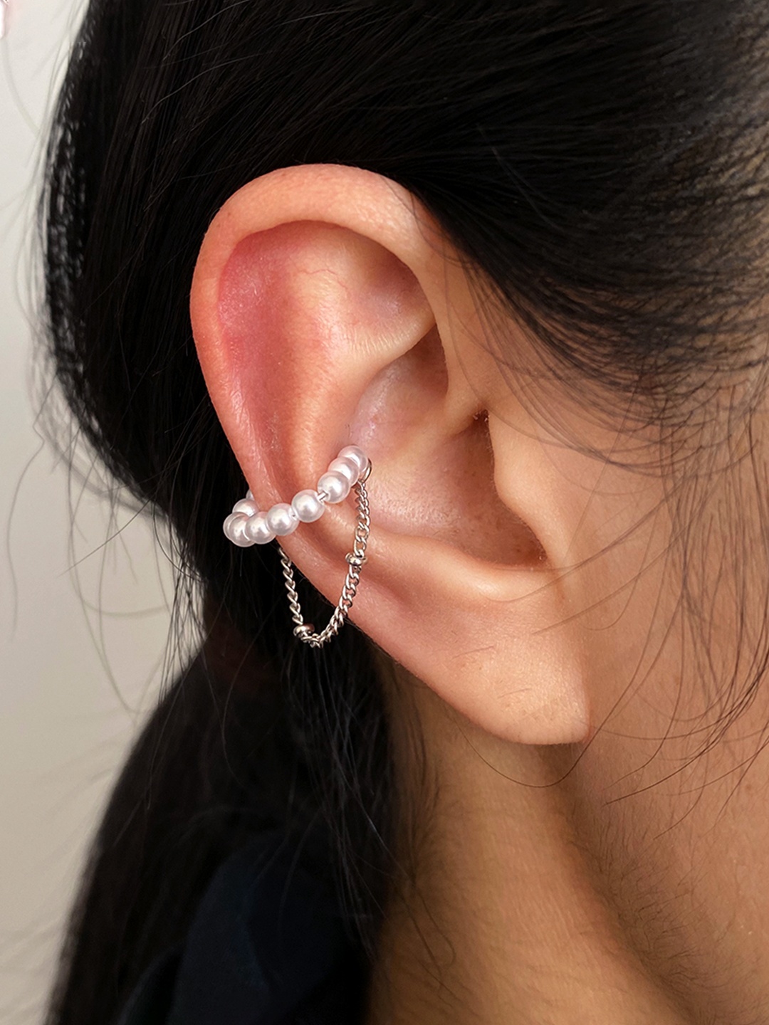 

Unwind by Yellow Chimes Woman Silver-Toned Contemporary White Pearl Studs Ear Cuff