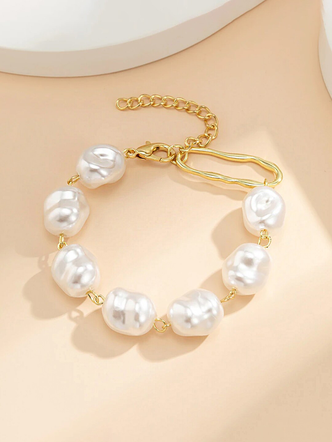

Unwind by Yellow Chimes Gold-Toned White Irregular Pearl Beaded Bracelet