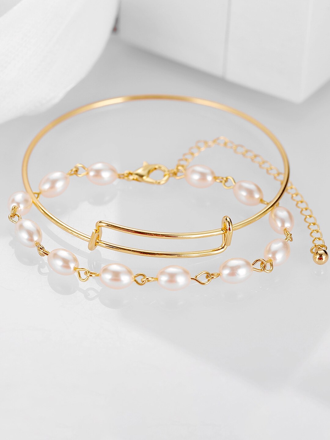 

Yellow Chimes Women Gold Toned Pearl Beaded Multilayered Statement Bracelet