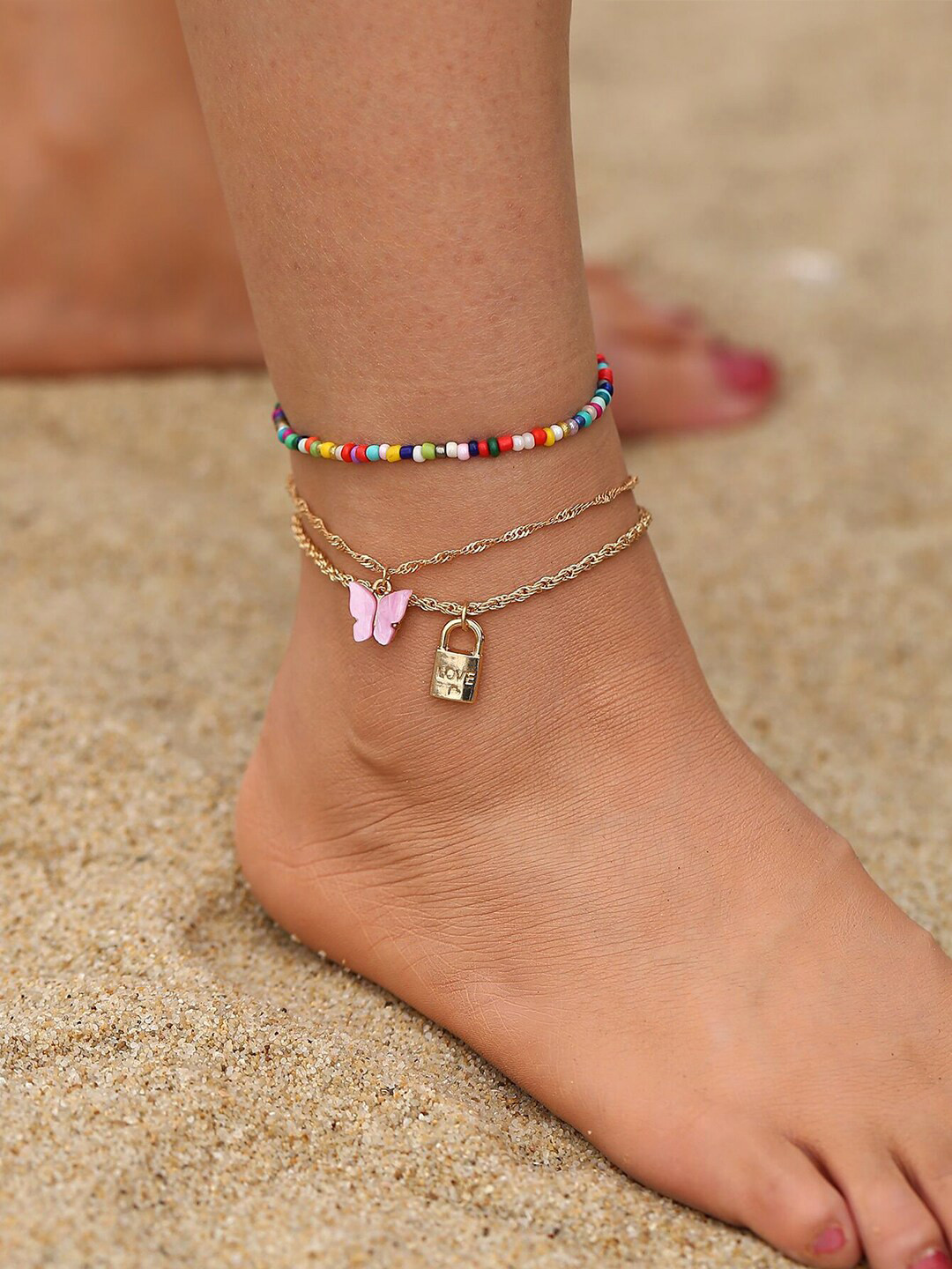 

Yellow Chimes Women Gold-Plated & White Layered With Butterfly Lock Hanging Charm Anklet