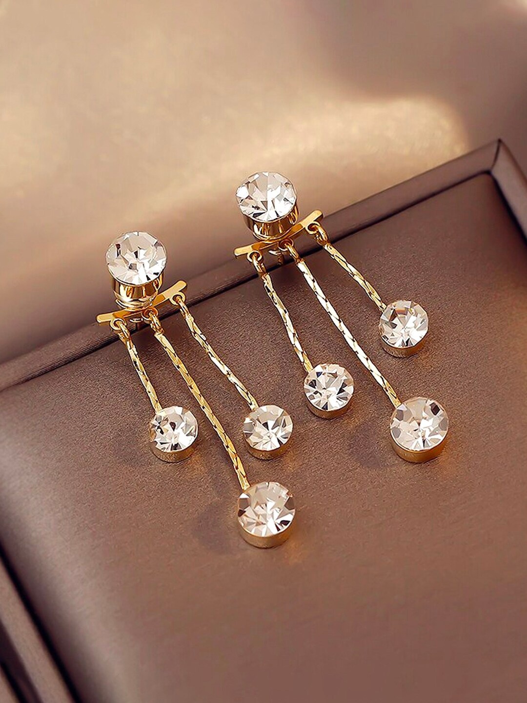 

Yellow Chimes Women Gold Toned Crystal Studded Tassel Drop Earrings