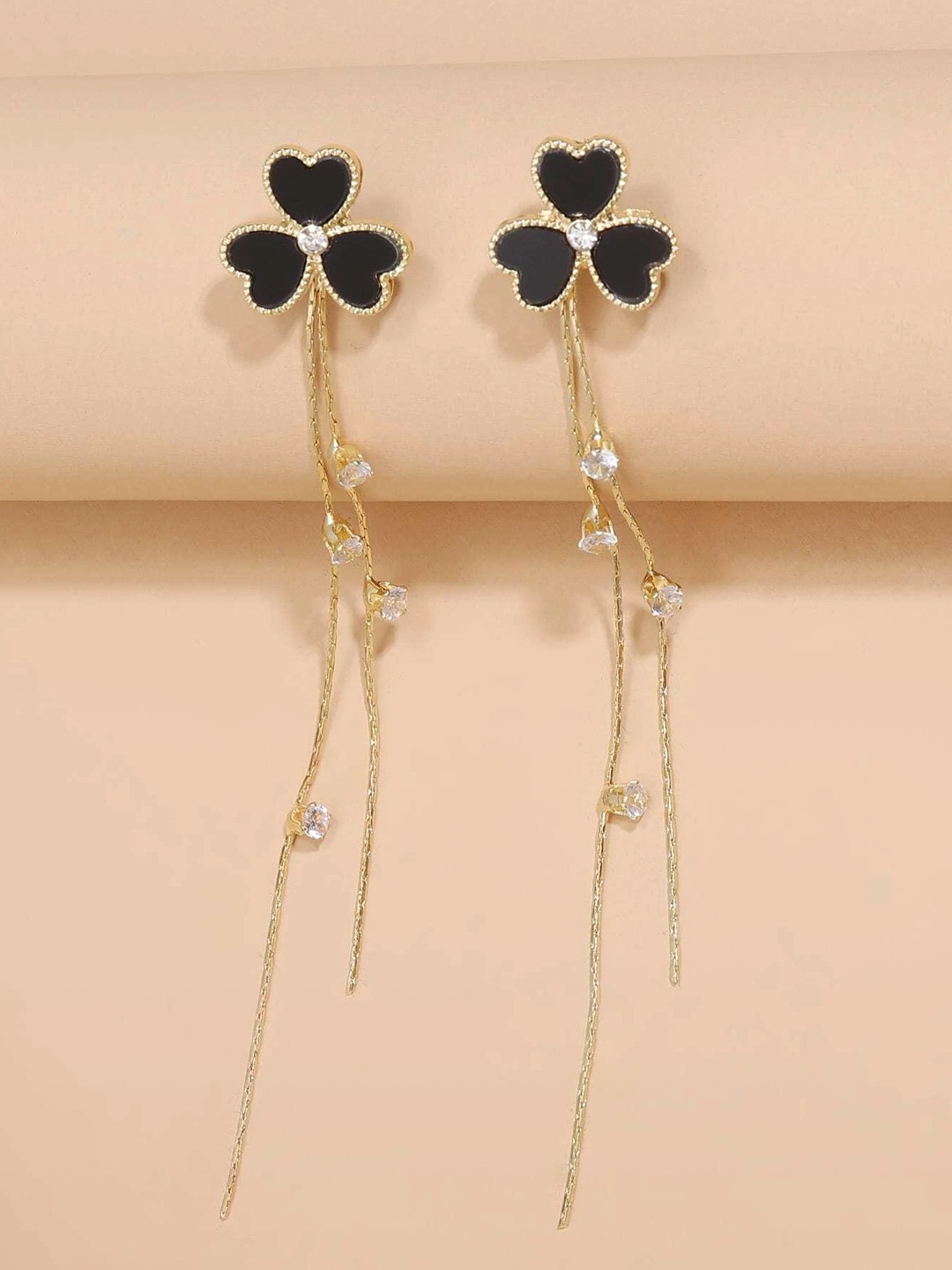 

Yellow Chimes Gold-Toned & Black Triple Heart Shaped Long Chain Dangle Earring