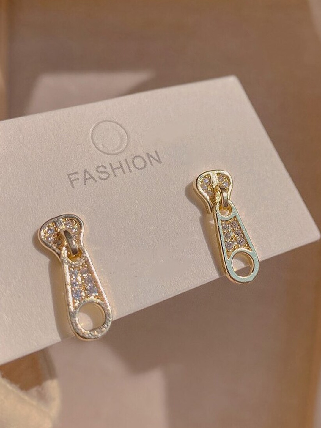 

Yellow Chimes Gold-Toned Crystal Studded Zip Shape Drop Earrings