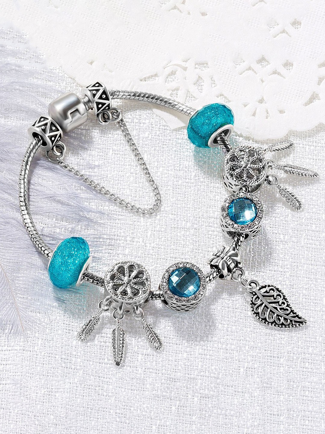

Yellow Chimes Eye-catching Silver Tone With Different Charms Hanging Bracelet