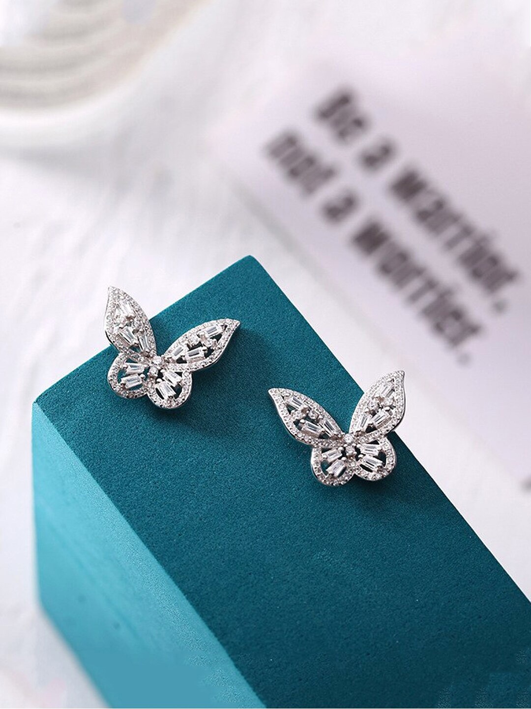 

Yellow Chimes Silver-Plated Cystal Studded Butterfly Shape Stud Earrings