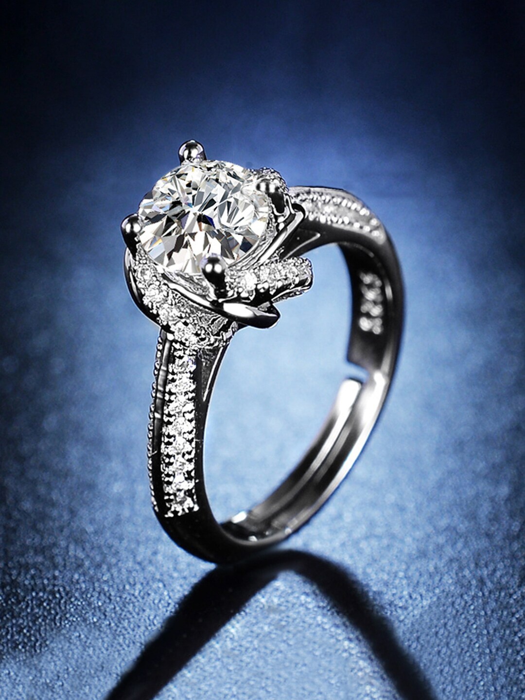 

Yellow Chimes Silver-Toned & Plated Crystal Studded Finger Ring