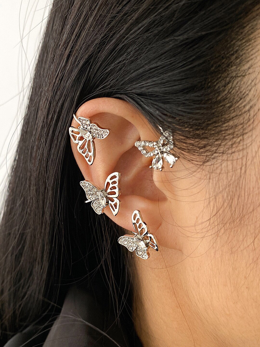 

Yellow Chimes Silver Tone Crystal Studded Non-Pierced Butterfly Designed Earrcuffs