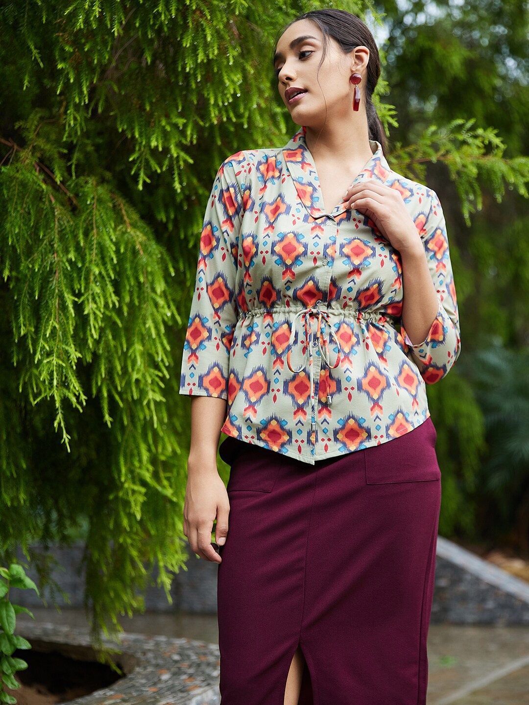 

Athena Green & Orange Abstract Print Empire Top