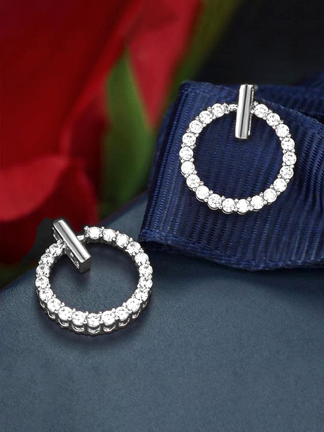 

Unwind by Yellow Chimes Silver Toned White Crystal Studded Drop Earrings